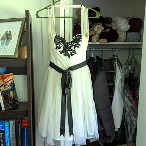 White with black sash and detailing Blondie nites by Stacy sicar formal d size 3